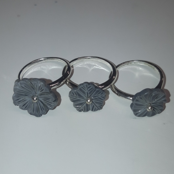 Two sets of flower stackable rings - Picture 2 of 4